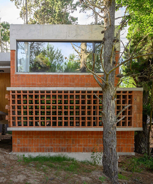 exposed concrete and brick residence adopts 1970s chalet typology in buenos aires forest