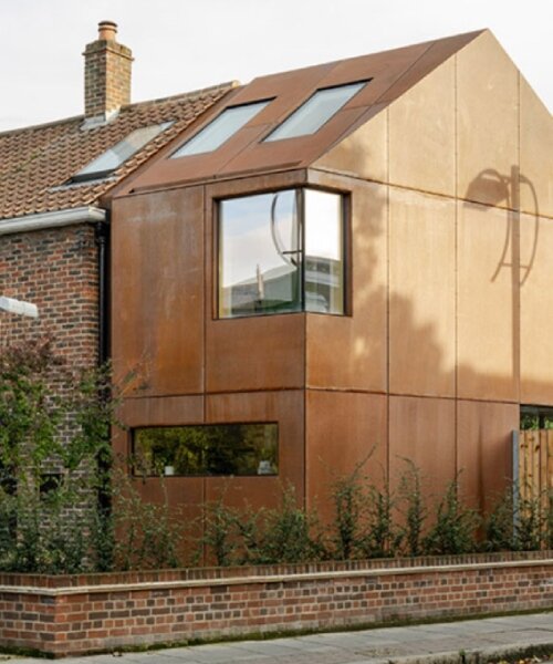 rusty corten steel extension modernizes 1950s brick home in london