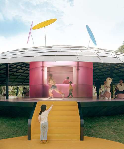 MAD architects honors childhood with flying saucer-like installation at chinese art festival